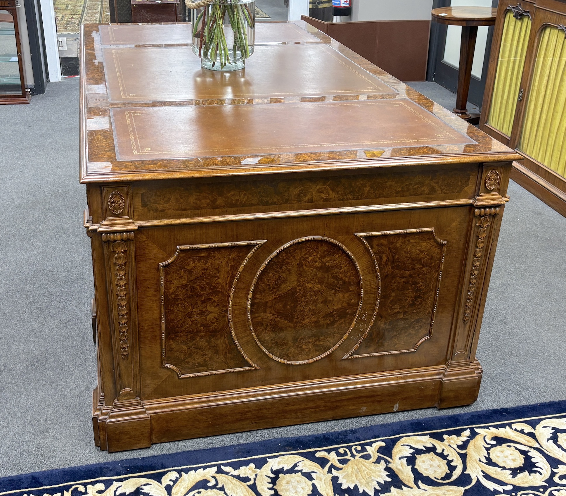 A George III style burr walnut pedestal partner's desk, width 193cm, depth 107cm, height 76cm